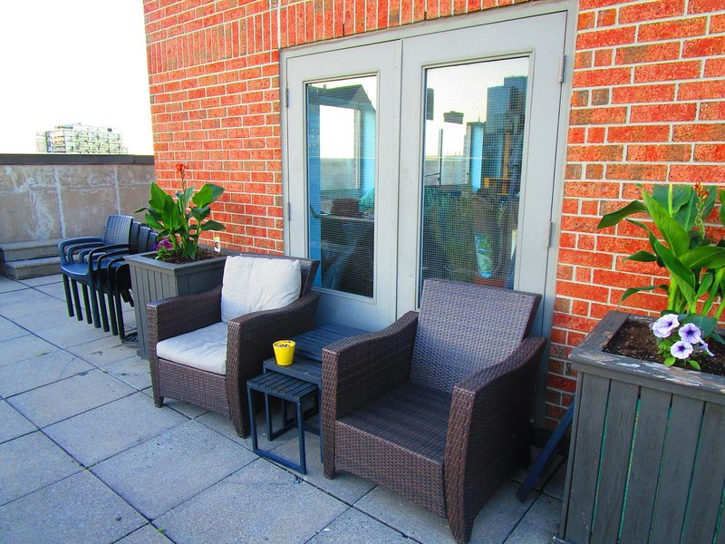 Chairs blocking a fire door — a common finding during fire risk assessments